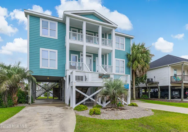 Photo 2 of Single family home for sale at 2911 E Pelican Dr, Oak Island, NC 28465 | MLS# 100514949 | Listing updated on 2026-08-18