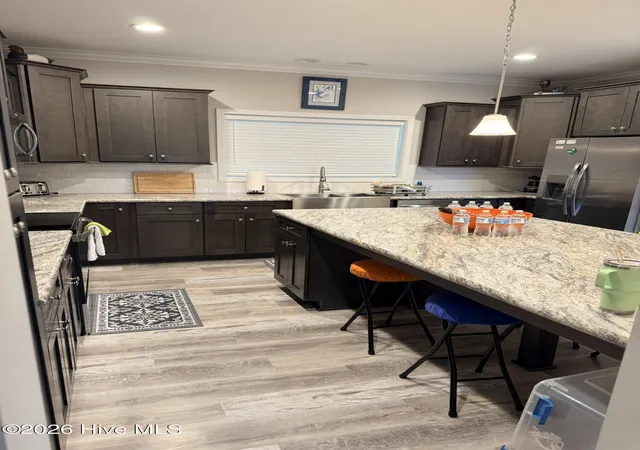 Photo 4 of Single family home for sale at 7218 Canal Dr, Emerald Isle, NC 28594 | MLS# 100600079 | Listing updated on 2026-09-01