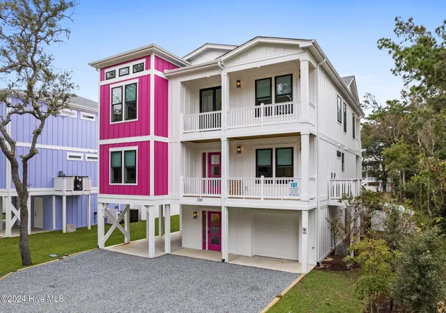 Photo 1 of Single family home for sale at 100 Se 66th Street, Oak Island, NC 28465 | MLS# 100584827 | Listing updated on 2026-08-25