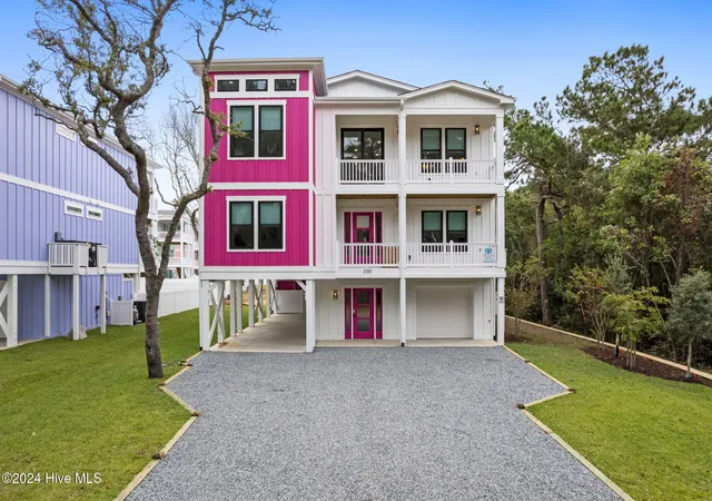 Photo 2 of Single family home for sale at 100 Se 66th Street, Oak Island, NC 28465 | MLS# 100584827 | Listing updated on 2026-08-25