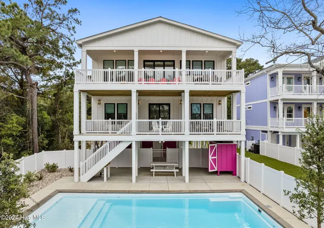 Photo 3 of Single family home for sale at 100 SE 66th Street, Oak Island, NC 28465 | MLS# 100584827 | Listing updated on 2026-08-25