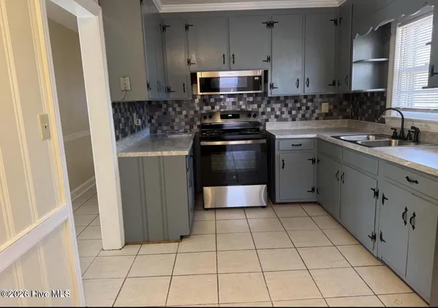 Photo 3 of Single family home for sale at 1220 Neal St, Rocky Mount, NC 27803 | MLS# 100590337 | Listing updated on 2026-09-12