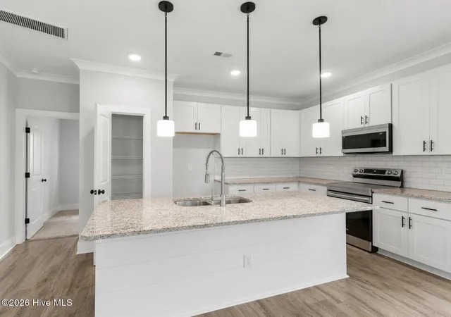 Photo 2 of Single family home for sale at 1171 N Caswell Ave, Southport, NC 28461 | MLS# 100590414 | Listing updated on 2026-08-18