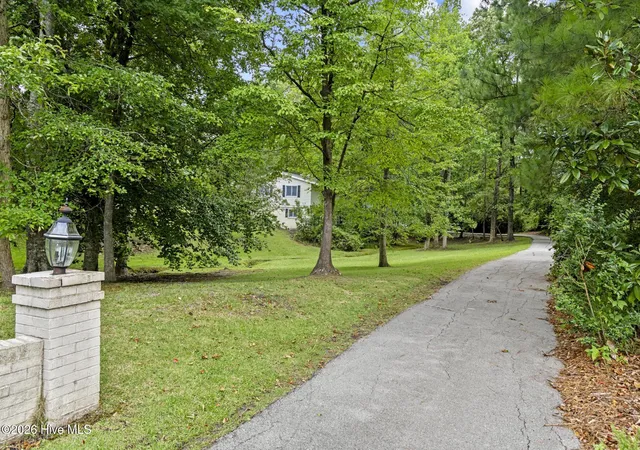 Photo 2 of Single family home for sale at 402 Country Clb Dr, Jacksonville, NC 28546 | MLS# 100594706 | Listing updated on 2026-09-08