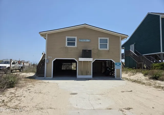 Photo 1 of Single family home for sale at 501 W Beach Dr, Oak Island, NC 28465 | MLS# 100581555 | Listing updated on 2026-08-18