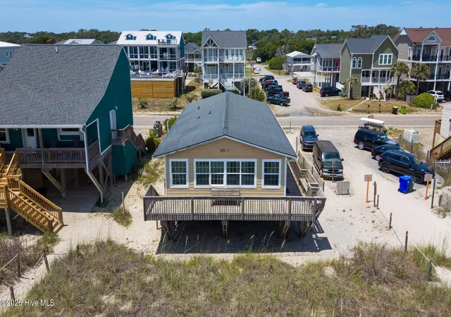 Photo 2 of Single family home for sale at 501 W Beach Dr, Oak Island, NC 28465 | MLS# 100581555 | Listing updated on 2026-08-18