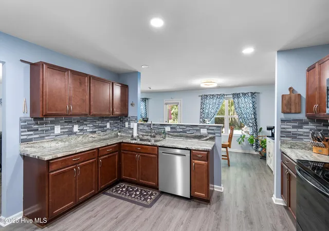Photo 3 of Single family home for sale at 35 Lighthouse Cvs Loop, Carolina Shores, NC 28467 | MLS# 100585068 | Listing updated on 2026-09-05