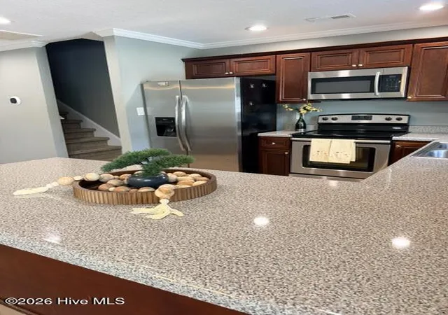 Photo 1 of Townhouse for sale at 205 Kenan Loop, Jacksonville, NC 28546 | MLS# 100600260 | Listing updated on 2026-09-10