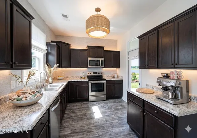 Photo 3 of Single family home for sale at 618 Osprey Landing Dr, Holly Ridge, NC 28445 | MLS# 100576981 | Listing updated on 2026-08-18