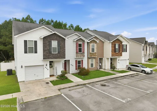 Photo 1 of Townhouse for sale at 404 Glenhaven Ln, Jacksonville, NC 28546 | MLS# 100592507 | Listing updated on 2026-08-18