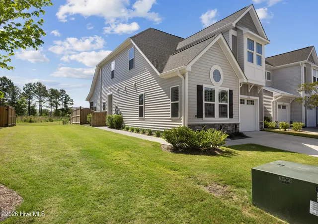 Photo 2 of Townhouse for sale at 7426 Springwater Dr, Wilmington, NC 28411 | MLS# 100580770 | Listing updated on 2026-08-30