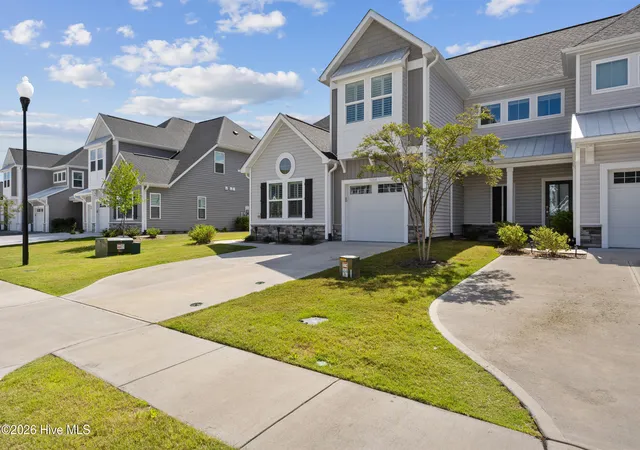Photo 3 of Townhouse for sale at 7426 Springwater Dr, Wilmington, NC 28411 | MLS# 100580770 | Listing updated on 2026-08-30