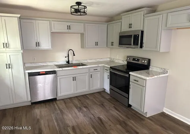Photo 4 of Single family home for sale at 115 Kitt Dr, Jacksonville, NC 28540 | MLS# 100569881 | Listing updated on 2026-10-08