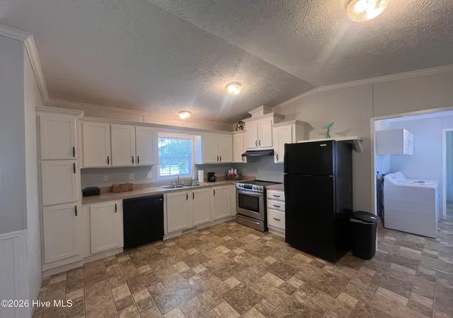 Photo 3 of Manufactured home for sale at 204 Diamond City Dr, Harkers Island, NC 28531 | MLS# 100592945 | Listing updated on 2026-08-18