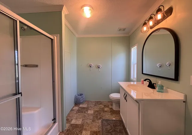 Photo 4 of Manufactured home for sale at 204 Diamond City Dr, Harkers Island, NC 28531 | MLS# 100592945 | Listing updated on 2026-08-18