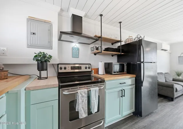 Photo 3 of Single family home for sale at 100 E Bogue Sound Dr, Atlantic Beach, NC 28512 | MLS# 100573979 | Listing updated on 2026-08-18