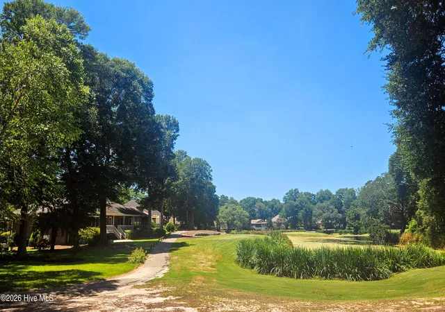 Photo 1 of Land for sale at 476 Lake Shore Dr, Sunset Beach, NC 28468 | MLS# 100579636 | Listing updated on 2026-08-08