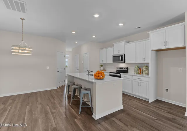 Photo 3 of Townhouse for sale at 7113 Fisk Dr NE #Lot 44, Leland, NC 28451 | MLS# 100588512 | Listing updated on 2026-09-20