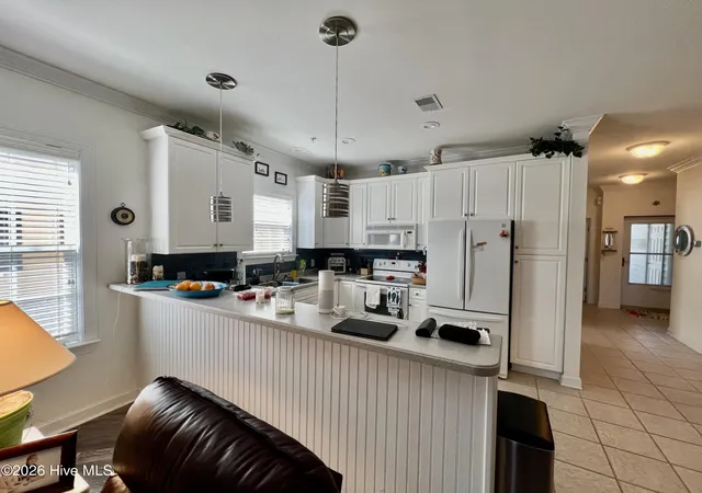 Listing Photo 5 - Condo for sale in building located at 182 Clubhouse Rd, Sunset Beach, NC 28468 - Unit #Apt 4