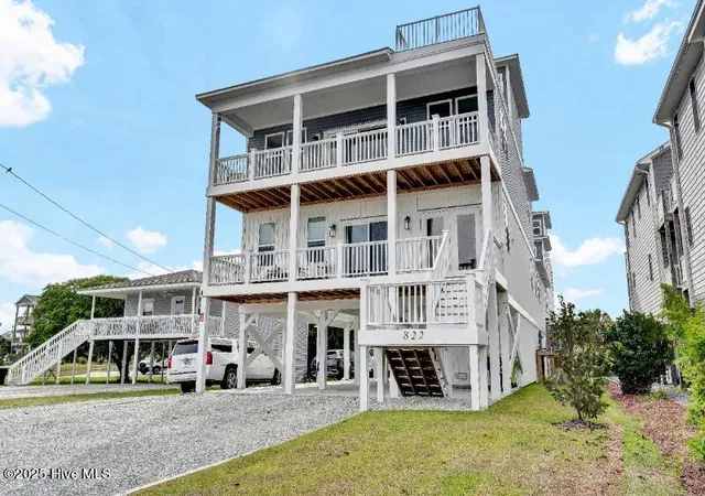 Photo 1 of Townhouse for sale at 822 S Topsail Dr #A, Surf City, NC 28445 | MLS# 100590315 | Listing updated on 2026-09-09