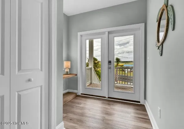 Photo 3 of Townhouse for sale at 822 S Topsail Dr #A, Surf City, NC 28445 | MLS# 100590315 | Listing updated on 2026-09-30