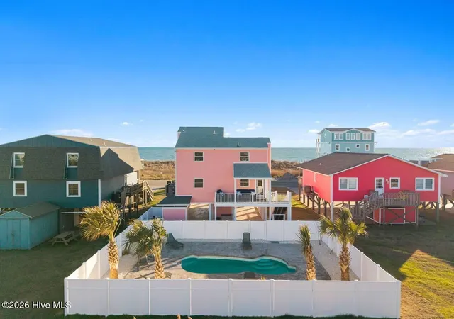 Photo 2 of Single family home for sale at 5518 E Beach Dr, Oak Island, NC 28465 | MLS# 100553322 | Listing updated on 2026-09-02