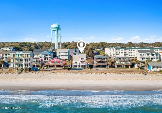 Photo 4 of Single family home for sale at 5518 E Beach Dr, Oak Island, NC 28465 | MLS# 100553322 | Listing updated on 2026-09-02