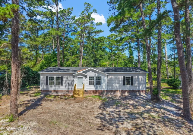 Photo 1 of Manufactured home for sale at 1869 Mission Hills Dr, Wilmington, NC 28405 | MLS# 100576795 | Listing updated on 2026-08-18