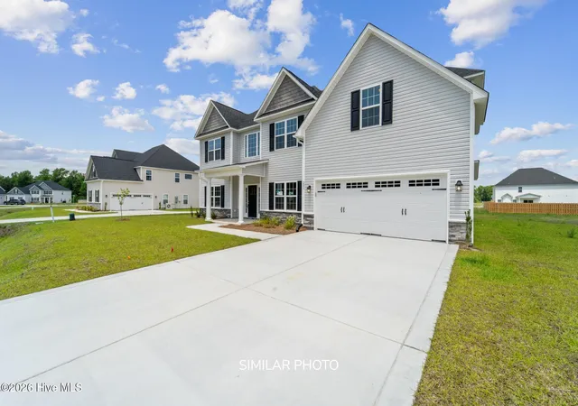 Photo 2 of Single family home for sale at 703 Atlantic Coast Ln, Jacksonville, NC 28546 | MLS# 100584359 | Listing updated on 2026-09-04