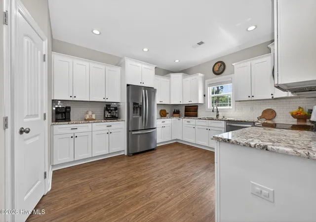 Photo 4 of Single family home for sale at 131 NE 15th Street, Oak Island, NC 28465 | MLS# 100593718 | Listing updated on 2026-09-02