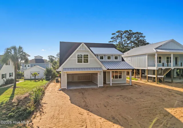 Photo 1 of Single family home for sale at 312 Ne 58th Street, Oak Island, NC 28465 | MLS# 100594847 | Listing updated on 2026-08-18