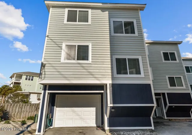 Photo 1 of Condo for sale at 1412 Canal Dr #A, Carolina Beach, NC 28428 | MLS# 100594497 | Listing updated on 2026-09-18