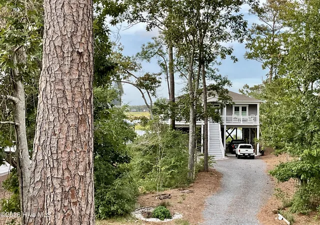 Photo 2 of Single family home for sale at 5605 E Yacht Dr, Oak Island, NC 28465 | MLS# 100594769 | Listing updated on 2026-08-18