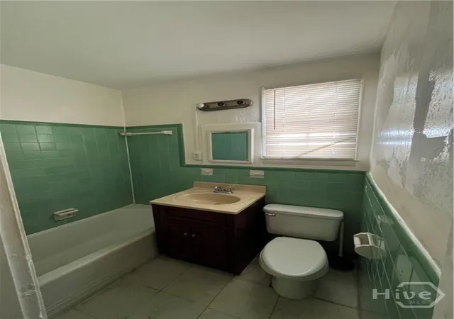 Photo 3 of Single family home for sale at 1113-1115 E 55th Street, Savannah, GA 31404 | MLS# SA349633 | Listing updated on 2026-08-28