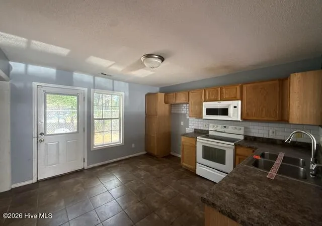Photo 3 of Condo for sale at 145 Cornerstone Pl, Jacksonville, NC 28546 | MLS# 100566973 | Listing updated on 2026-10-07