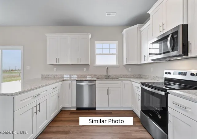 Photo 4 of Single family home for sale at 465 Mill St, Elizabeth City, NC 27909 | MLS# 100592354 | Listing updated on 2026-09-08