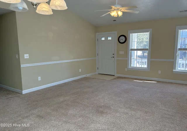 Photo 2 of Single family home for sale at 115 Nw 20th Street, Oak Island, NC 28465 | MLS# 100589420 | Listing updated on 2026-08-18