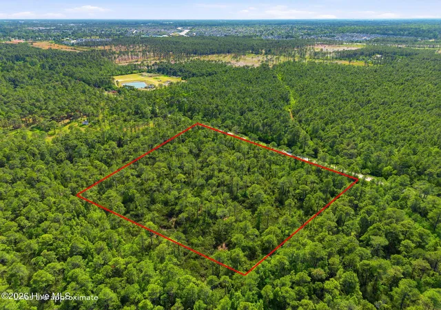 Photo 3 of Land for sale at 7604 Plantation Rd, Wilmington, NC 28411 | MLS# 100572290 | Listing updated on 2026-08-18