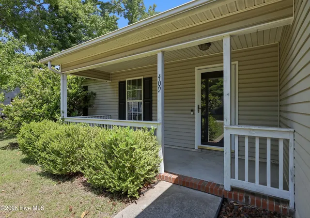 Photo 2 of Single family home for sale at 409 Spring Dr, Jacksonville, NC 28540 | MLS# 100584504 | Listing updated on 2026-08-18