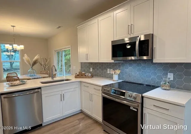 Photo 3 of Single family home for sale at 40 N Bandwheel Way, Hampstead, NC 28443 | MLS# 100593437 | Listing updated on 2026-08-18