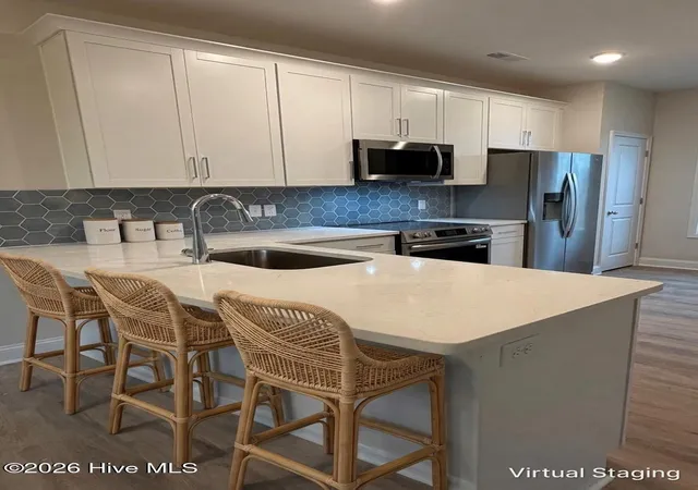 Photo 3 of Single family home for sale at 40 N Bandwheel Way, Hampstead, NC 28443 | MLS# 100593437 | Listing updated on 2026-08-18