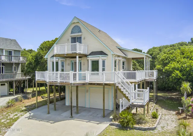 Photo 1 of Single family home for sale at 104 Bluewater Dr, Emerald Isle, NC 28594 | MLS# 100584957 | Listing updated on 2026-09-10