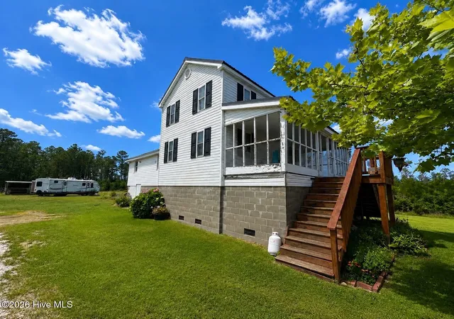 Photo 2 of Single family home for sale at 1063 Highway 70, Stacy, NC 28581 | MLS# 100581471 | Listing updated on 2026-08-18