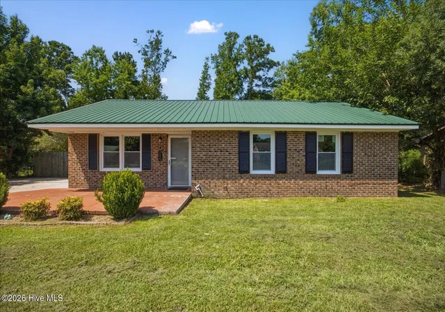 Photo 1 of Single family home for sale at 122 Candlewood Dr, Wilmington, NC 28411 | MLS# 100596291 | Listing updated on 2026-09-03