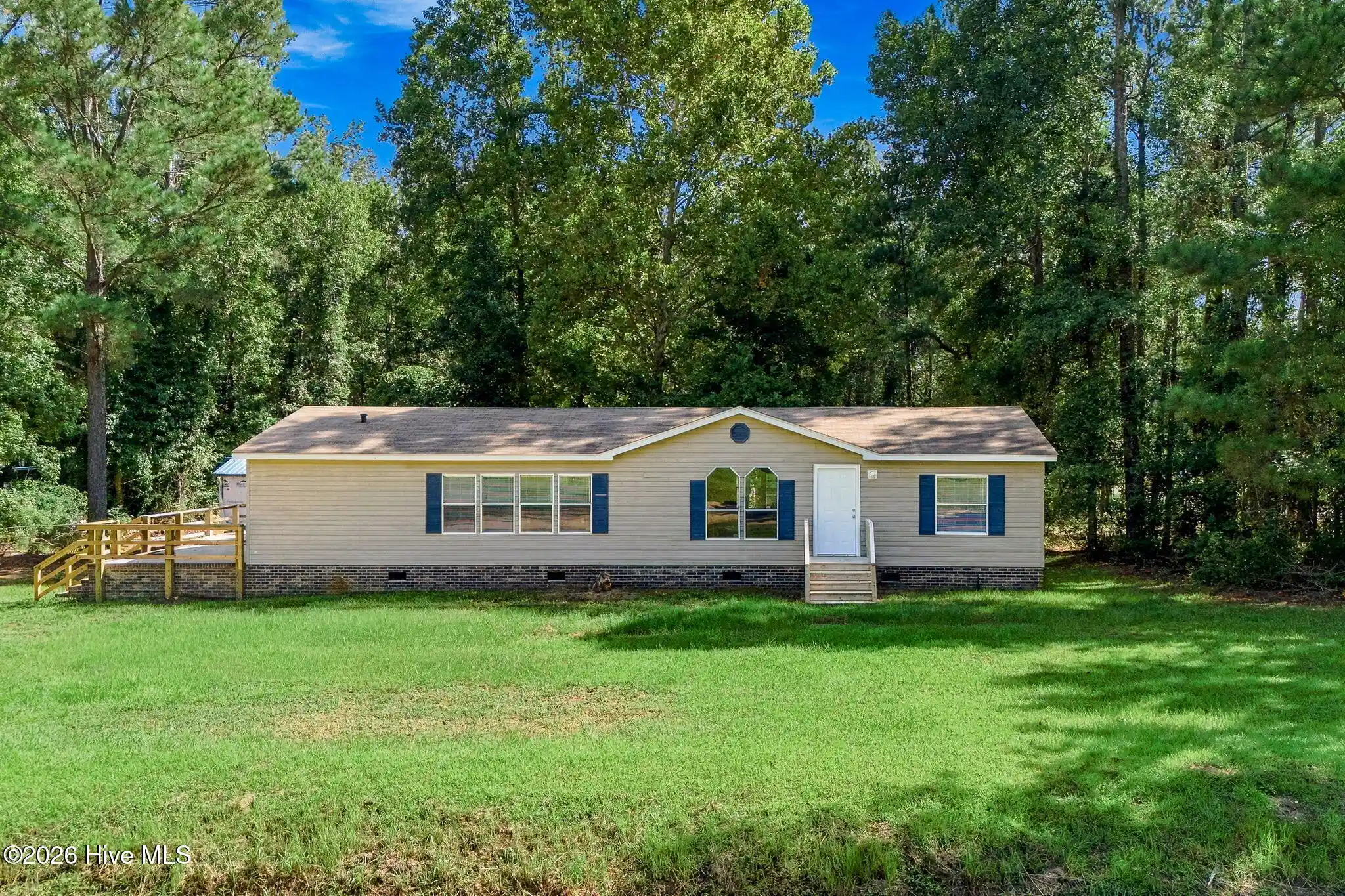 Photo 1 of Manufactured home for sale at 5612 Deerfield Pl Ne, Winnabow, NC 28479 | MLS# 100603750 | Listing updated on 2026-10-29