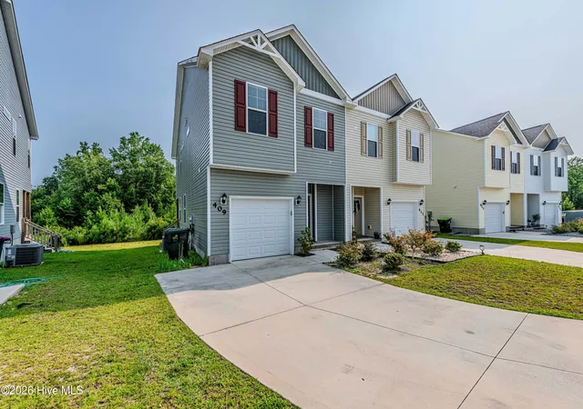 Photo 1 of Townhouse for sale at 409 Blockade Shl Ln, Jacksonville, NC 28546 | MLS# 100591555 | Listing updated on 2026-09-03