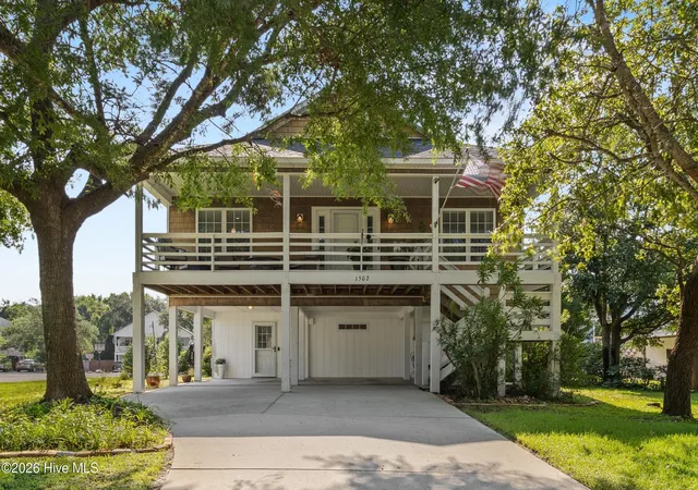 Photo 1 of Single family home for sale at 1502 Bertram Dr, Carolina Beach, NC 28428 | MLS# 100592962 | Listing updated on 2026-09-14
