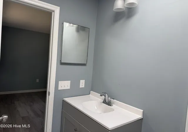 Photo 20 of Single family home for sale at 102 Nw 20th Street, Oak Island, NC 28465 | MLS# 100582358 | Listing updated on 2026-08-28