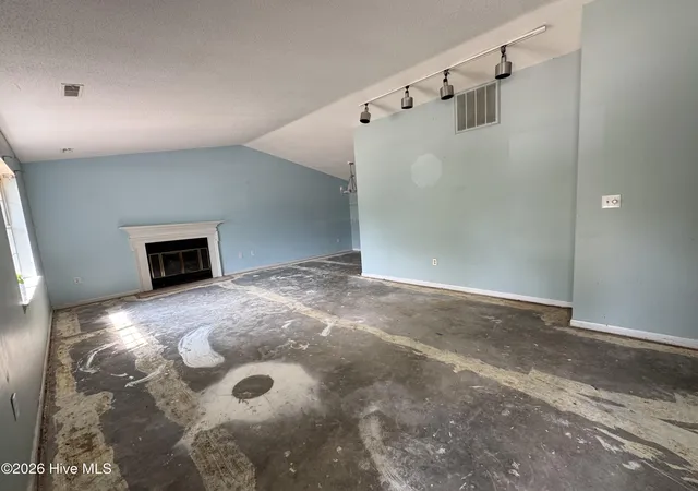 Photo 5 of Single family home for sale at 102 NW 20th Street, Oak Island, NC 28465 | MLS# 100582358 | Listing updated on 2026-08-28