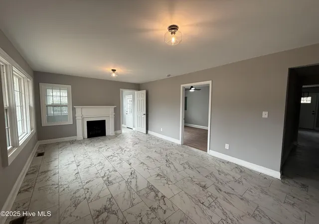 Photo 3 of Single family home for sale at 203 Stewart Ave, Clinton, NC 28328 | MLS# 100546902 | Listing updated on 2026-09-18